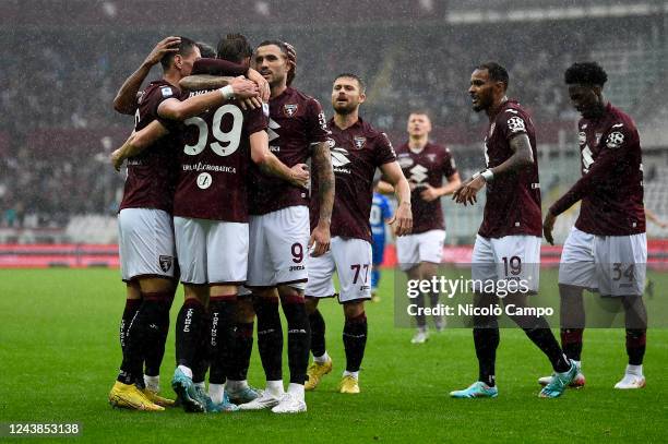 Aleksei Miranchuk of Torino FC celebrates with his teammates after scoring a goal later disallowed by VAR during the Serie A football match between...