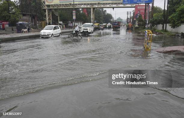 Rain water seen accumulated on Lal Kuan Road on October 9, 2022 in Ghaziabad, India. Heavy rains are lashing parts of Delhi leading to traffic snarls...