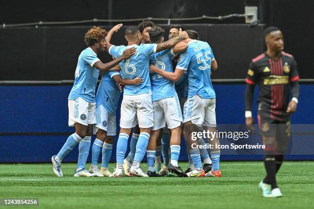 Players celebrate the goal by NYCFC midfielder Gabriel Pereira during the MLS match between New York City FC and Atlanta United FC on October 9th,...