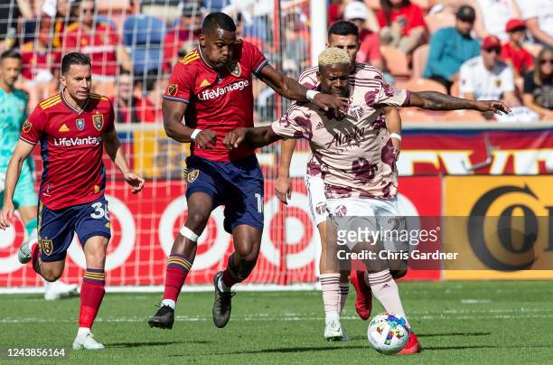 Sergio Cordova of Real Salt Lake battles for the ball with Darion Asprilla of the Portland Timbers during the first half of their game October 9,...