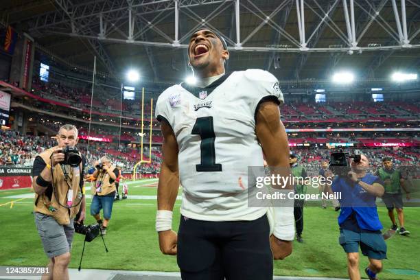Jalen Hurts of the Philadelphia Eagles celebrates after an NFL football game against the Arizona Cardinals at State Farm Stadium on October 9, 2022...