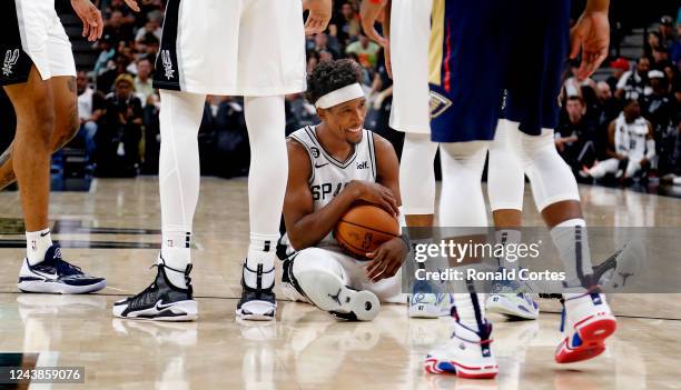 Josh Richardson of the San Antonio Spurs smiles at the New Orleans Pelicans bench after he was fouled during the game at the AT&T Center on October...