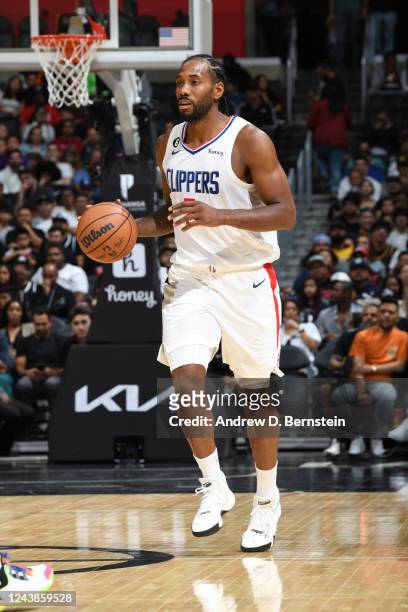 Kawhi Leonard of the LA Clippers dribbles the ball against the Minnesota Timberwolves during a preseason game on October 9, 2022 at Crypto.com Arena...