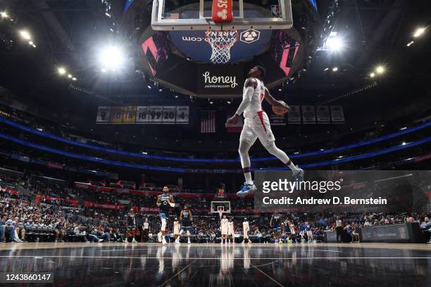 Paul George of the LA Clippers goes to the basket against the Minnesota Timberwolves during a preseason game on October 9, 2022 at Crypto.com Arena...