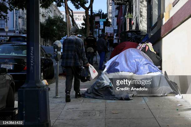 Homeless people are seen in Tenderloin district of San Francisco in California, United States on October 9, 2022.