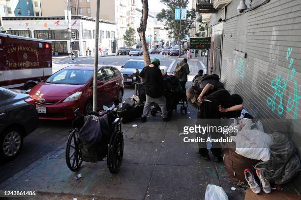 Homeless people are seen in Tenderloin district of San Francisco in California, United States on October 9, 2022.