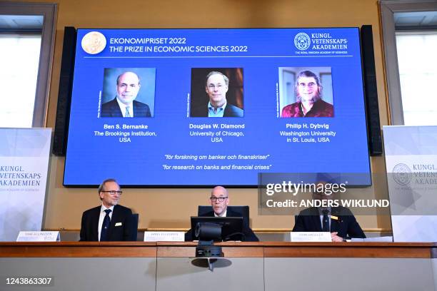 Secretary General of the Royal Swedish Academy of Sciences Hans Ellegren and Members of the Economics Nobel Prize committee Tore Ellingsen and John...