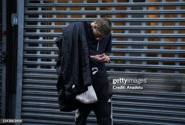 Homeless people are seen on streets of the Kensington neighborhood as homelessness and drug addiction hit Philadelphia in Pennsylvania, United States...