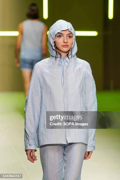 Model walks the runway during Fora de Jogo fashion show at ModaLisboa Oasis, Lisbon Fashion Week.