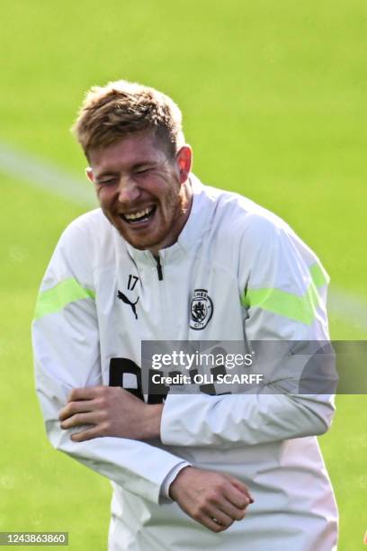 Attends a team's training session at Manchester City training ground in Manchester on October 10 on the eve of their UEFA Champions League group G...