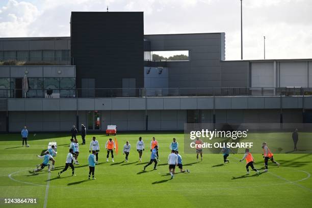 Manchester City's players attend a team's training session at Manchester City training ground in Manchester on October 10 on the eve of their UEFA...