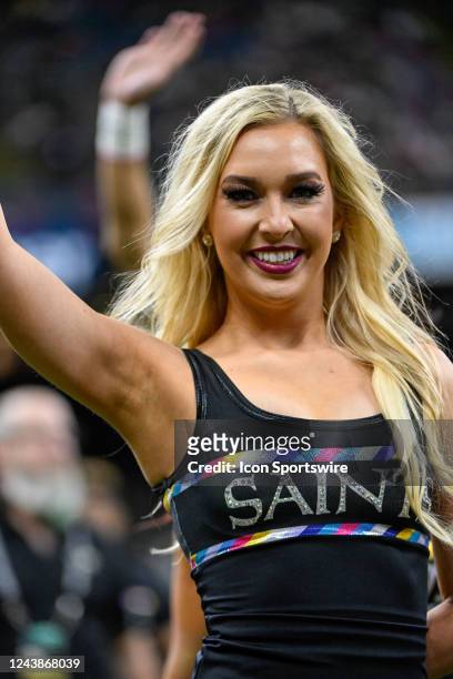 Saints cheerleaders rev up the crowd during the football game between the Seattle Seahawks and New Orleans Saints at Caesars Superdome on October 9,...