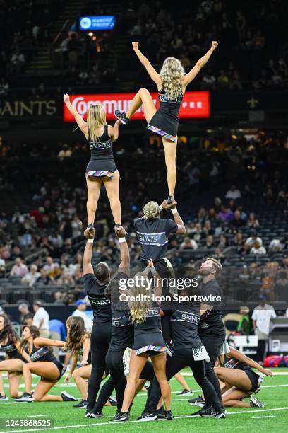 Saints cheerleaders rev up the crowd during the football game between the Seattle Seahawks and New Orleans Saints at Caesars Superdome on October 9,...