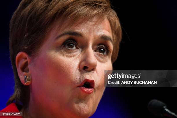 Scotland's First Minister and leader of the Scottish National Party , Nicola Sturgeon, reacts as she delivers her speech to delegates at the annual...