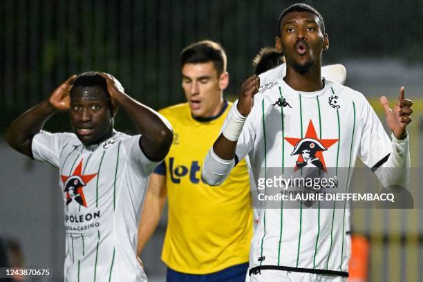 Cercle's Kevin Denkey and Cercle's Jean Harisson Marcelin look dejected during a soccer match between RUSG Royale Union Saint-Gilloise and Cercle...