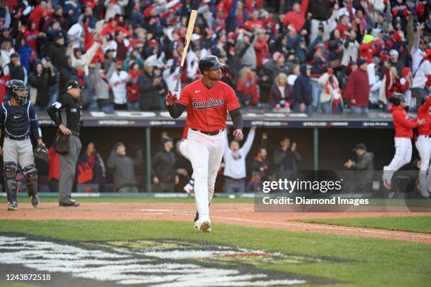 Oscar Gonzalez of the Cleveland Guardians celebrates hitting a walk-off solo home run in the fifteenth inning of game 2 of the Wild Card series...