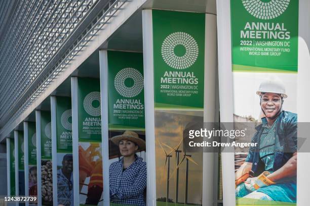 Signage outside the World Bank headquarters is displayed on the first day of the IMF and World Bank Annual Meetings on October 10, 2022 in...