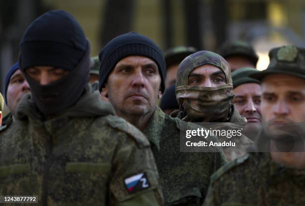 Russian citizens drafted during the partial mobilization are seen being dispatched to combat coordination areas after a military call-up for the...