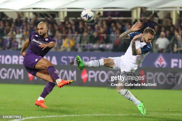 Sofyan Amrabat of ACF Fiorentina in action against Manuel Lazzari of SS Lazio during the Serie A match between ACF Fiorentina and SS Lazio at Stadio...