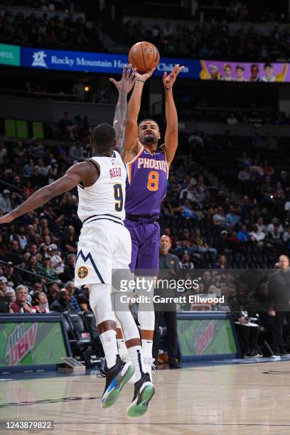 Timothe Luwawu-Cabarrot of the Phoenix Suns shoots the ball against the Denver Nuggets during a preseason game on October 10, 2022 at the Ball Arena...