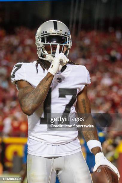 Las Vegas Raiders wide receiver Davante Adams celebrates in the end zone after scoring a touchdown during the second half against the Kansas City...