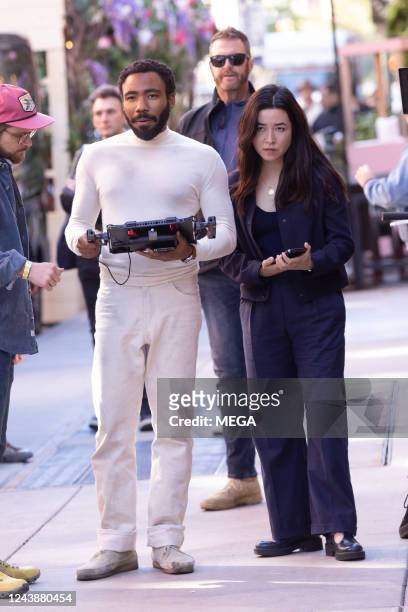 Donald Glover and Maya Erskine are seen on set for "Mr. And Mrs. Smith" on October 10, 2022 in New York.
