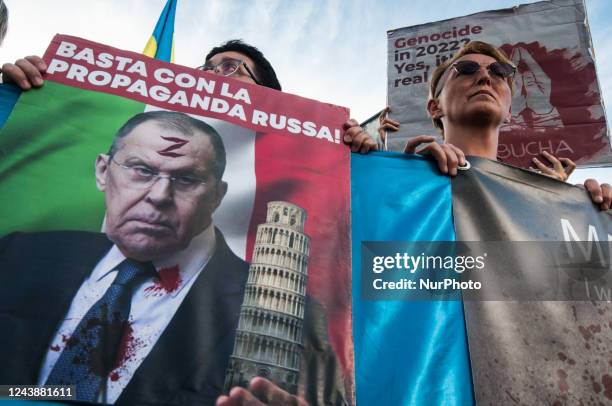 Ukrainian citizens demonstrate in the vicinity of the Embassy of the Russian Federation, at the metro station of Casto Petrolio against the 10...