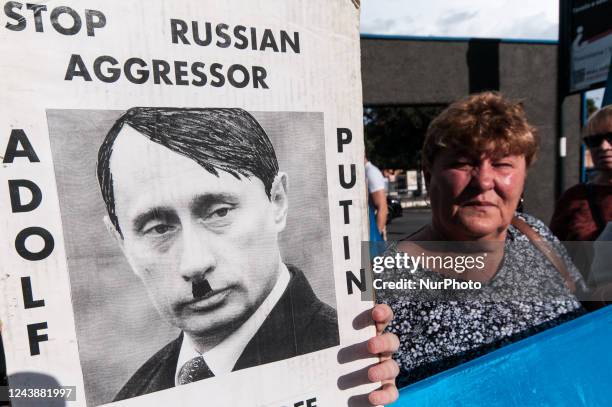 Ukrainian citizens demonstrate in the vicinity of the Embassy of the Russian Federation, at the metro station of Casto Petrolio against the 10...