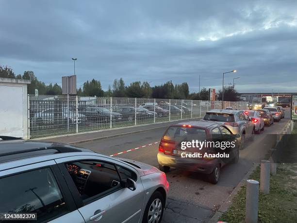 Drivers wait in queue to refuel their cars from the gas stations as fuel shortage continues in Goussainville, France on October 10, 2022.