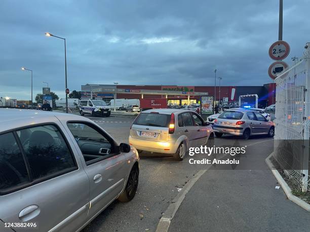 Drivers wait in queue to refuel their cars from the gas stations as fuel shortage continues in Goussainville, France on October 10, 2022.