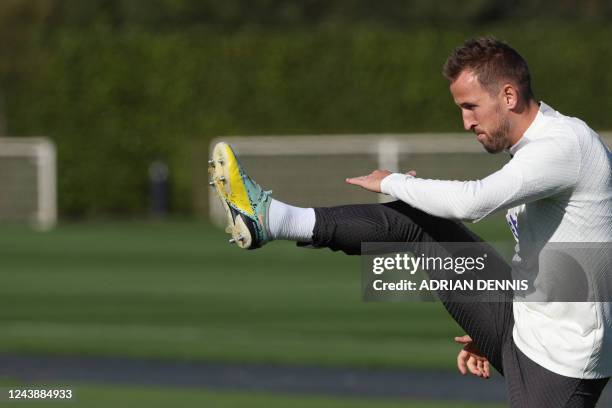 Tottenham Hotspur's English striker Harry Kane takes part in a team training session at Tottenham Hotspur Football Club Training Ground in north...