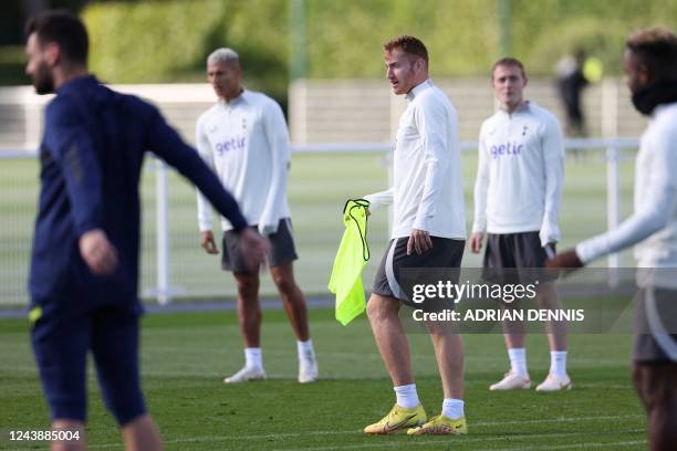 Tottenham Hotspur's Swedish midfielder Dejan Kulusevski takes part in a team training session at Tottenham Hotspur Football Club Training Ground in...