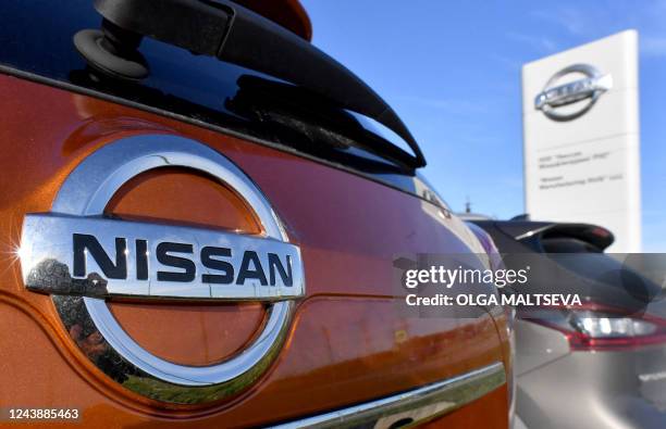 Nissan car is seen parked by a Nissan factory on the outskirts of Saint Petersburg on October 11, 2022. Japanese automaker Nissan will sell its...