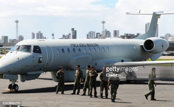 The crew of a Brazilian Air Force R-99 radar plane get ready to take off from Recife's airport on June 05 to search for debris or victims of the Air...