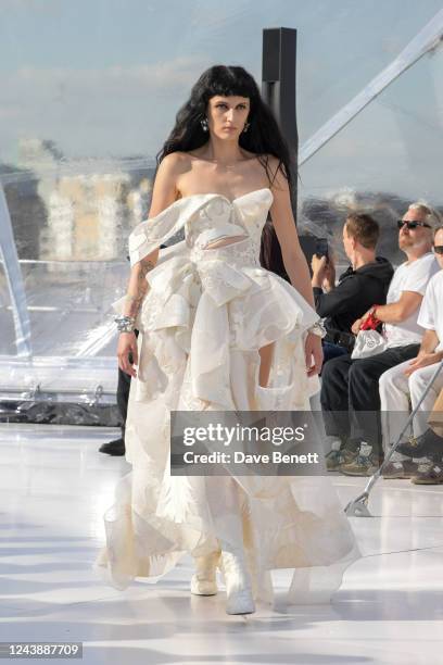 Model walks the runway at the Alexander McQueen SS23 Womenswear show at the Old Royal Naval College on October 11, 2022 in Greenwich, England.