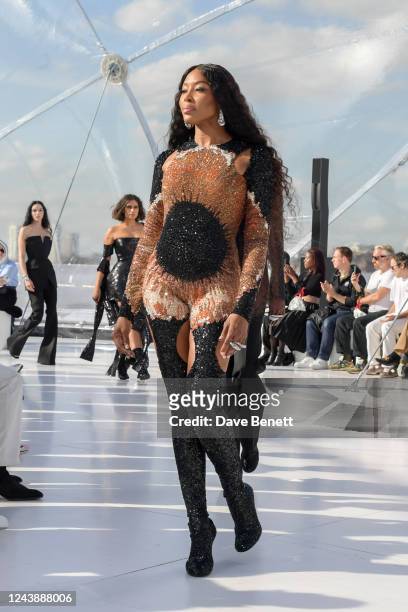 Naomi Campbell walks the runway at the Alexander McQueen SS23 Womenswear show at the Old Royal Naval College on October 11, 2022 in Greenwich,...