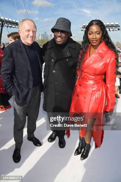 Francois-Henri Pinault, Editor-In-Chief of British Vogue Edward Enninful and Tiwa Savage attend the Alexander McQueen SS23 Womenswear show at the Old...