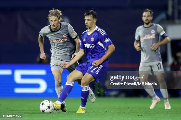 Dario Spikic of Dinamo Zagreb in action Maurits Kjaergaard of RB Salzburg during the UEFA Champions League group E match between Dinamo Zagreb and FC...