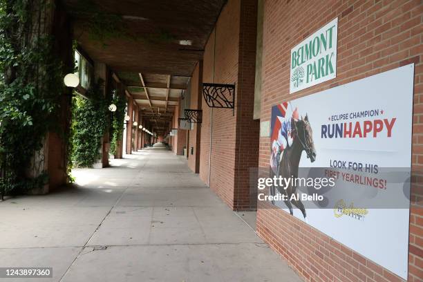 The walkway outside the main track remains empty of fans during the first day of live horse racing at Belmont Park on June 03, 2020 in Elmont, New...