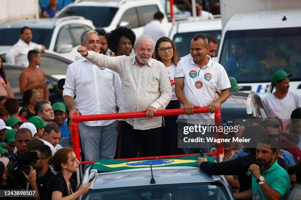 Former president of Brazil and candidate of Workers Party Luiz Inacio Lula Da Silva waves supporters next to his wife Rosangela Silva and Waguinho...