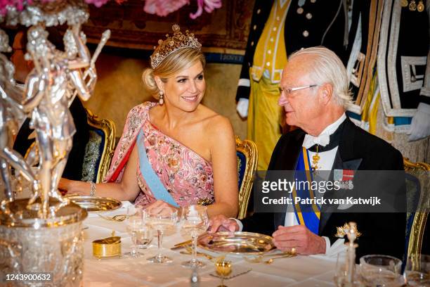 Queen Maxima of The Netherlands and King Carl Gustaf XVI of Sweden during the state banquet at the first day of the Dutch State visit to Sweden on...