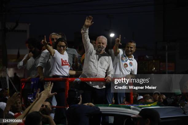Former president of Brazil and candidate of Workers Party Luiz Inacio Lula Da Silva waves supporters during a campaign rally ahead of presidential...