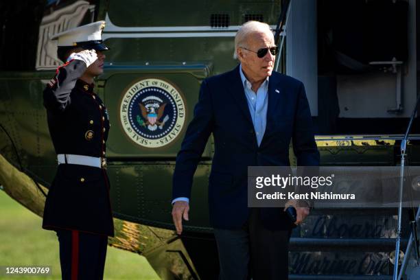 President Joe Biden disembarks from Marine One on the South Lawn of the White House and walks to the Oval Office on Monday, Oct. 10, 2022 in...