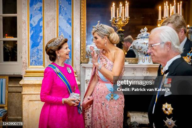 Queen Silvia of Sweden, Queen Maxima of The Netherlands and King Carl Gustaf XVI of Sweden during the state banquet at the first day of the Dutch...