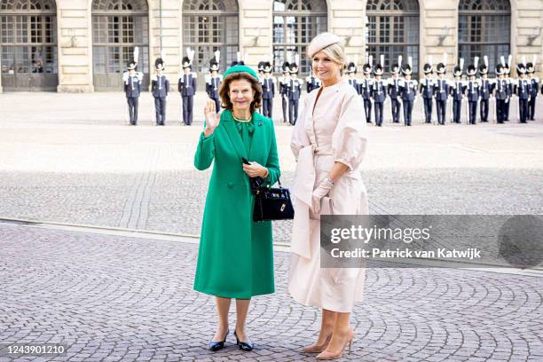 Queen Silvia of Sweden and Queen Maxima of the Netherlands during the official welcome ceremony on the first day of the Dutch State visit to Sweden...