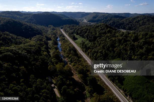 An aerial picture taken on September 29 shows an overview of Lost Creek, Kentucky. - Chase Hays is "torn": after seeing floods ravage his hamlet in...