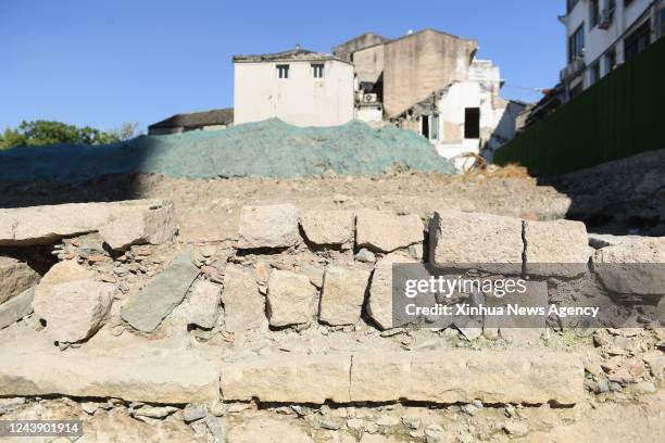 Photo taken on Oct. 10, 2022 shows ruins of buildings from different periods discovered at the archaeological site of Shuomen ancient port in...