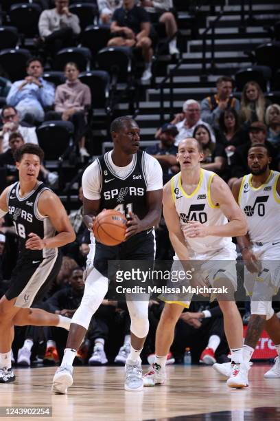 Gorgui Dieng of the San Antonio Spurs handles the ball during the game against the Utah Jazz on October 11, 2022 at vivint.SmartHome Arena in Salt...