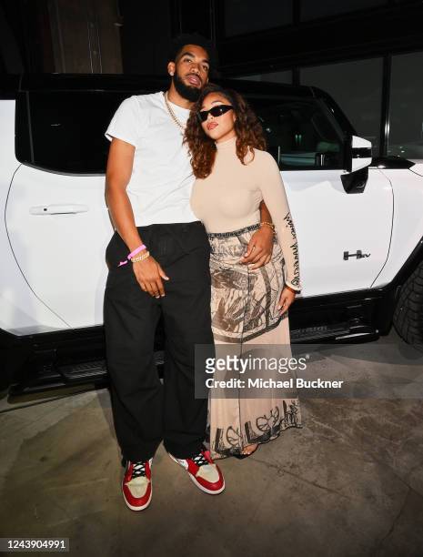 Jordyn Woods and Karl-Anthony Towns at the GMC Hummer EV Campaign Launch with Don C held on October 11, 2022 in Los Angeles, California.