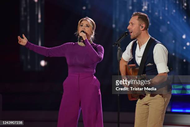 Beatrice Egli and swiss singer Marco Kunz on stage during the recording of German Swiss TV show "Die Beatrice Egli Show" at Studio Berlin on October...